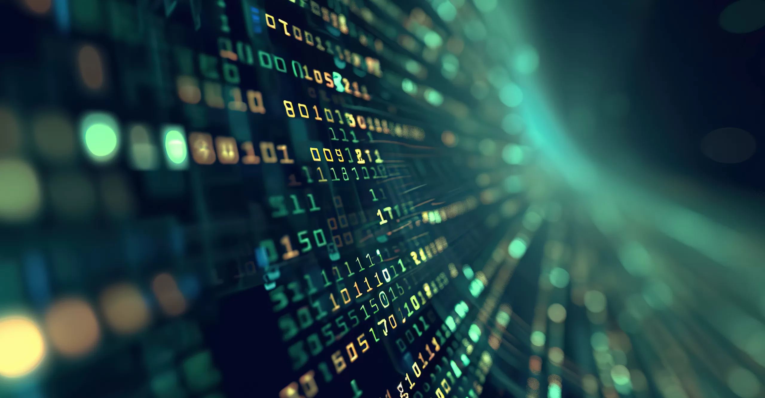 A close-up of a digital screen displaying lines of binary code in green and yellow. The perspective creates a tunnel-like effect, giving a sense of depth and motion, evocative of advanced systems hardening processes in action.